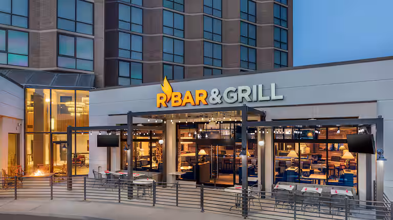 Hilton Arlington Hotel R Bar & Grill Exterior at Dusk